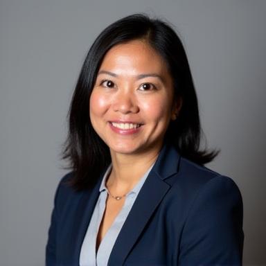 Professional headshot of Dr. Evelyn Tan, Director of Care.
